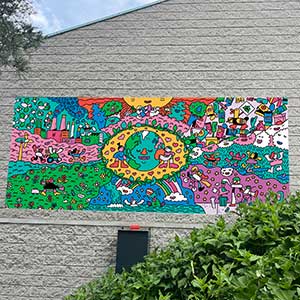 Murale de Guillaume Perreault sur un bâtiment.