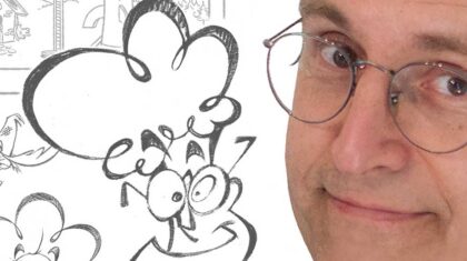 François Kiraly avec des images de bande dessinée qu'il a fait